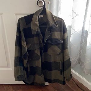 Dark green and black plaid Shacket style jacket.